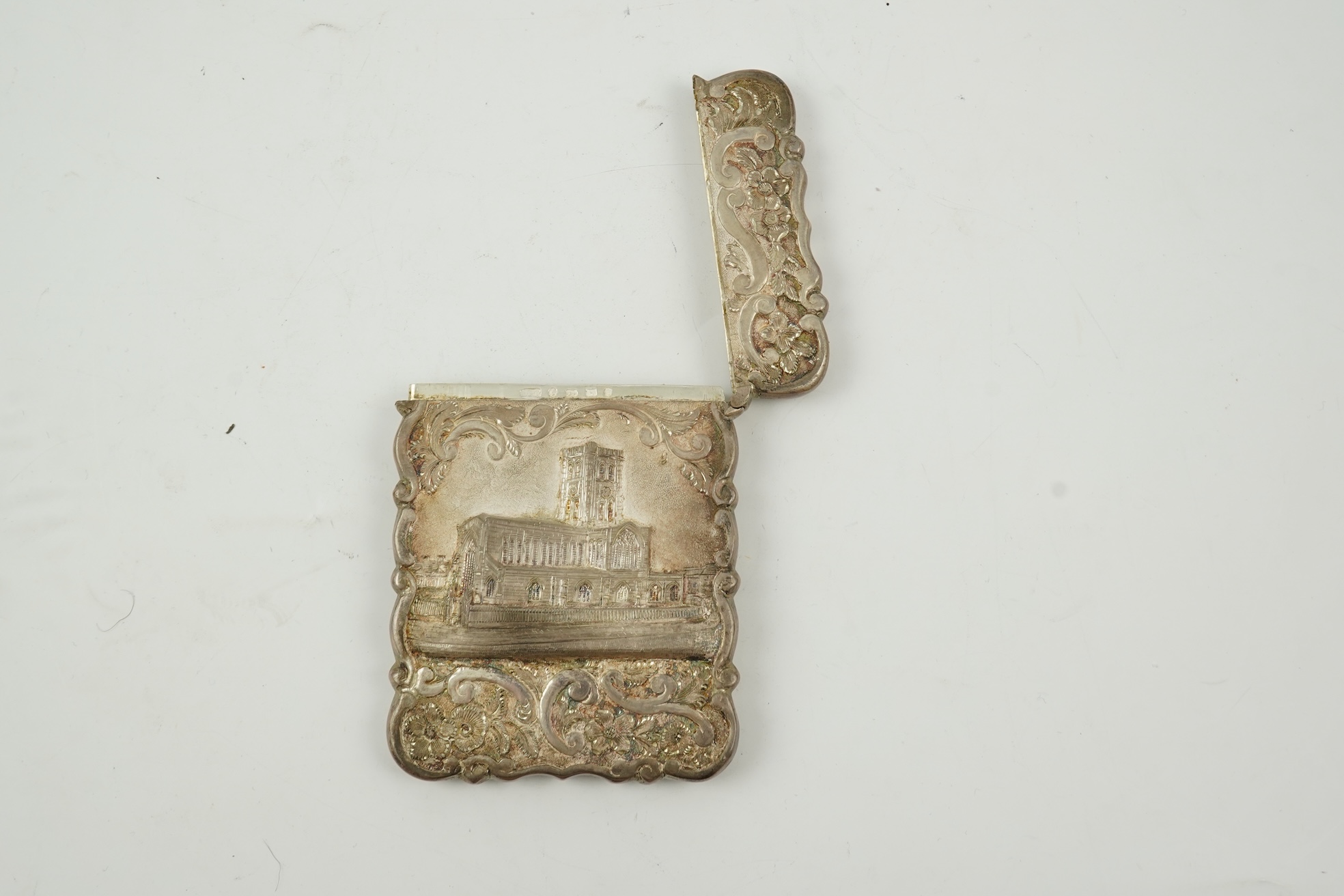 A Victorian silver 'castle top' card case by Hilliard & Thomason?